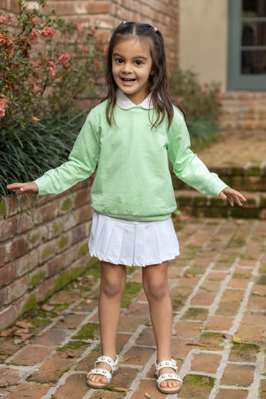 PLAY+ Girls Millie Tennis Skirt in vibrant colors, perfect for active play and stylish outings.
