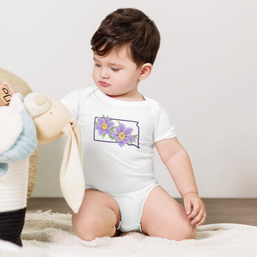 Pasqueflower short sleeve onesie for babies, featuring a cute floral design and soft fabric. Perfect for comfort and style.