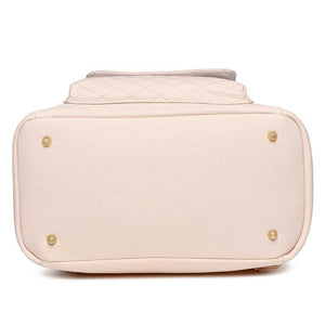 Pastel pink Petit Diaper Bag at angle 8, stylish and functional for modern parents.