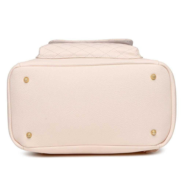 Pastel pink Petit Diaper Bag at angle 8, stylish and functional for modern parents.