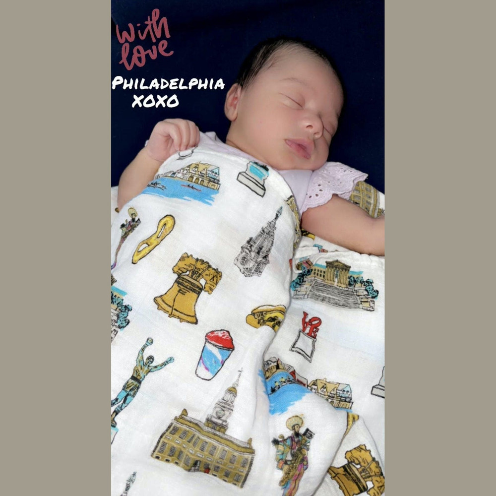 Philadelphia Baby Muslin Swaddle Blanket and Burp Cloth/Bib Combo gift set for newborns, soft and stylish essentials.