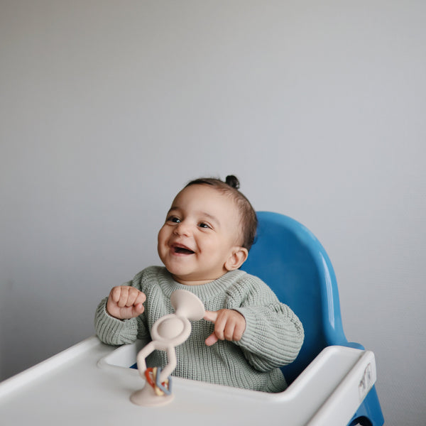 HexaPop Suction Toy in vibrant colors, perfect for sensory play and developing fine motor skills for babies.