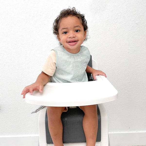 Dino Friends Sage Bapron for preschoolers on sale, angled view showcasing fun dinosaur design.