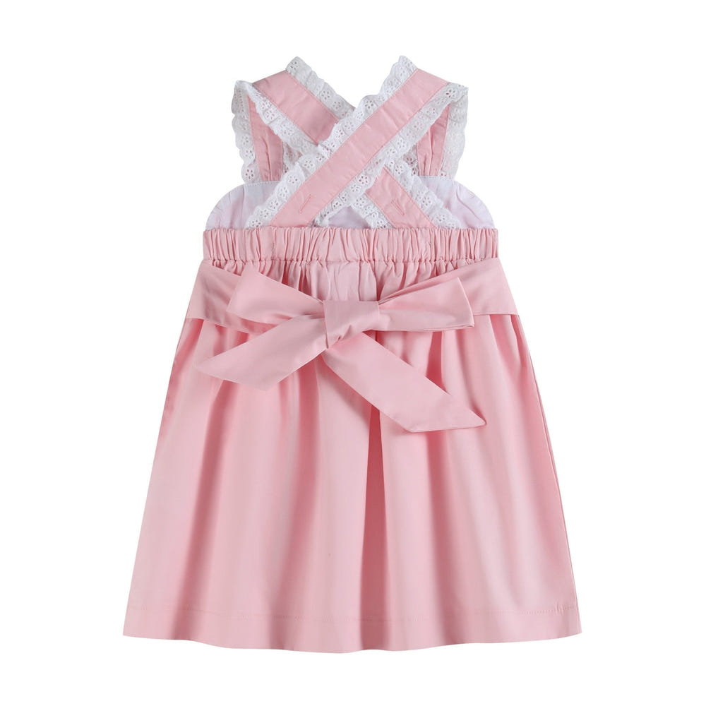 Pink and lace piggy dress for babies, perfect for special occasions and everyday wear.