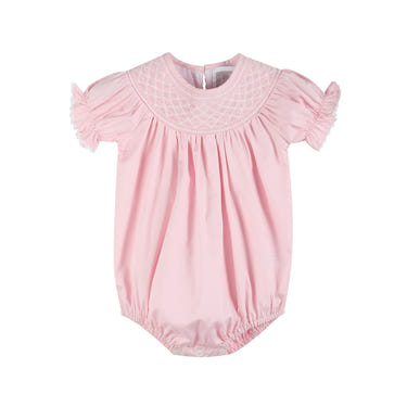 Pink and white smocked bubble romper for babies, perfect for stylish and comfortable playtime.