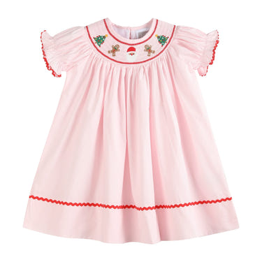 Pink Christmas smocked bishop dress for babies, perfect for festive celebrations and holiday gatherings.