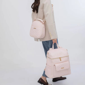 Pastel pink signature diaper bag at angle 10, stylish and functional for modern parents.