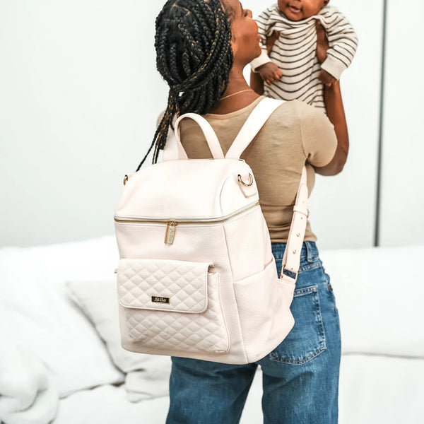 Pastel pink signature diaper bag, angle 13 view, stylish and functional for modern parents.