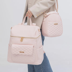 Pastel pink signature diaper bag, stylish and functional, shown from angle 2 for a detailed view.