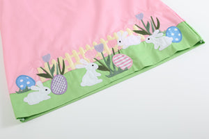 Pink Easter Bunny Garden Dress for babies, showcasing a cute design from angle 2. Perfect for spring celebrations!