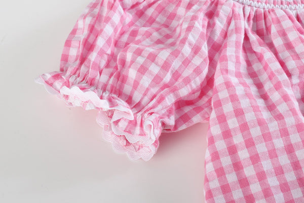 Pink Gingham Classic Smocked Bishop Dress for babies, shown from angle 3, perfect for special occasions.