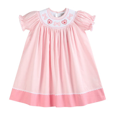 Pink Hearts & Bows Smocked Bishop Dress for babies, featuring a charming design perfect for special occasions.