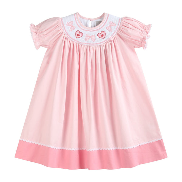 Pink Hearts & Bows Smocked Bishop Dress for babies, featuring a charming design perfect for special occasions.