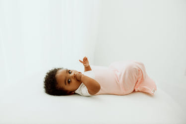 Pink Arms Out™ Short Sleeve Sleep Sack for babies, promoting safe and comfortable sleep.