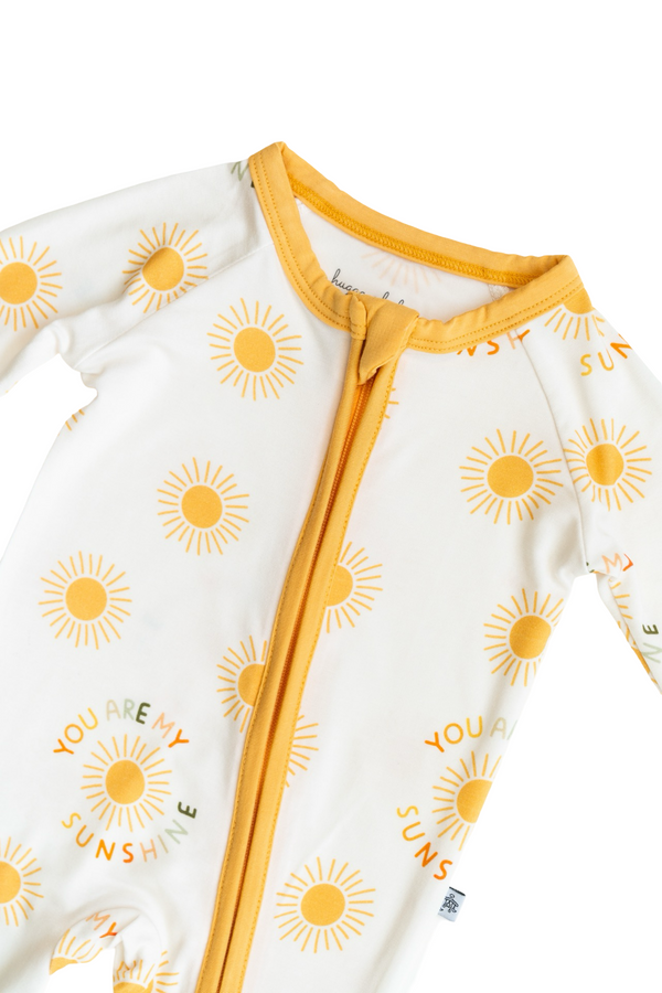 "You Are My Sunshine Zipper Lounger for babies in cozy loungewear, shown from angle 4."