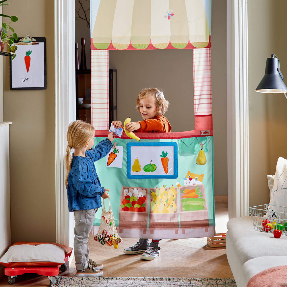Hanging Doorway Play Store for babies, featuring colorful play food and engaging activities for imaginative play.