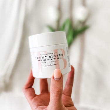 Tummy Butter Post Pregnancy Stretch Mark Cream for effective postpartum skin care and stretch mark removal.