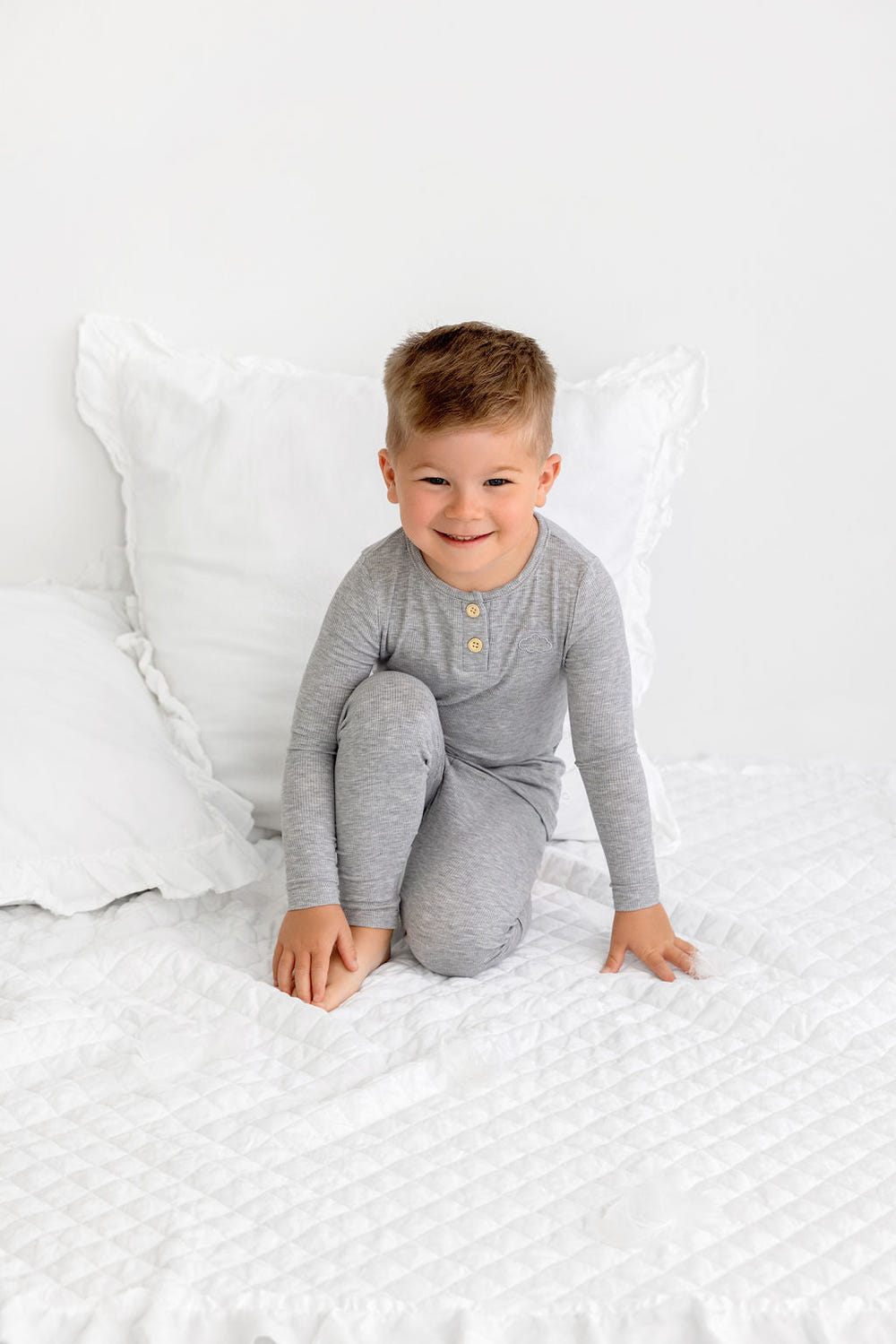 Grey Henley PJ for babies, soft and cozy sleepsuit perfect for comfortable sleep.