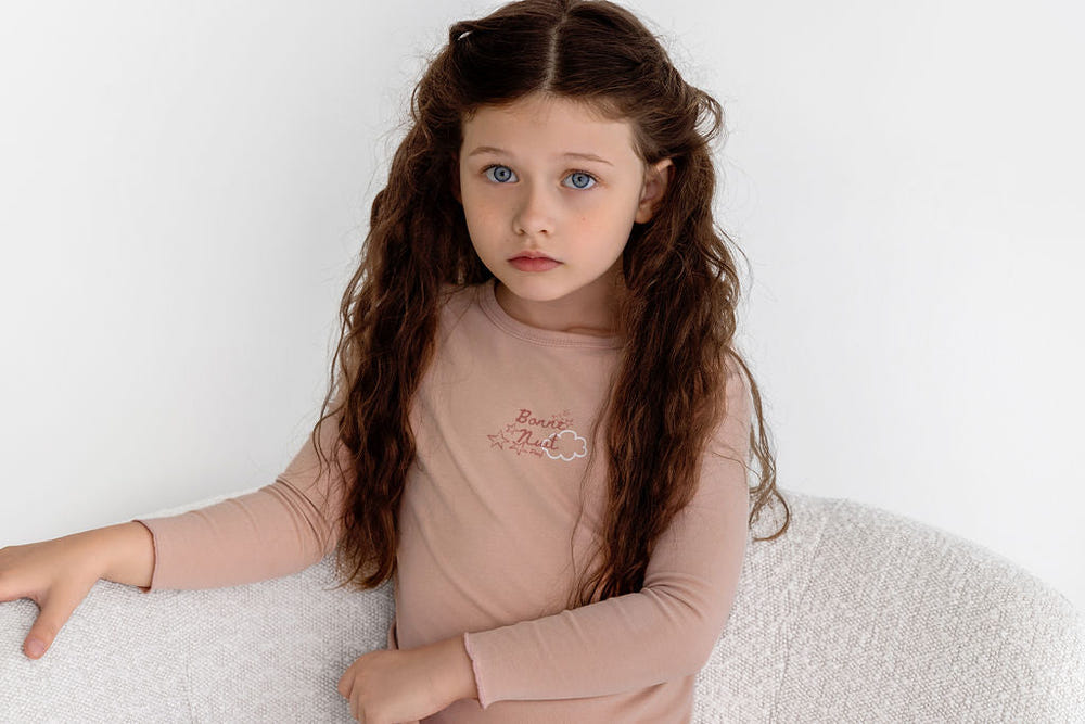 Bonne Nuit PJ in Dusty Pink - Cozy sleepsuit for babies, perfect for a peaceful night's sleep.