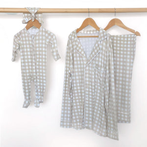 Women's long sleeve gingham pajama set for babies, perfect for cozy sleep and stylish bedding.
