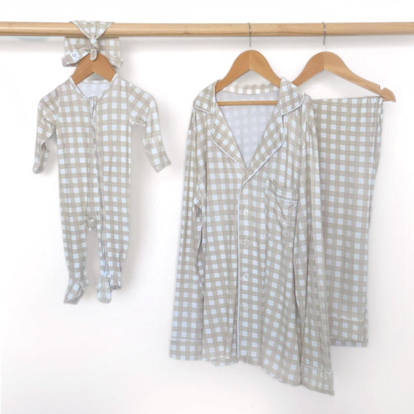 Women's long sleeve gingham pajama set for babies, perfect for cozy sleep and stylish bedding.