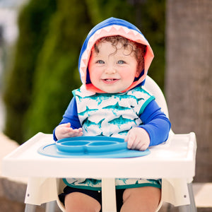 Shark Attack Bapron for babies, featuring a fun shark design, angled view showcasing its unique style and functionality.