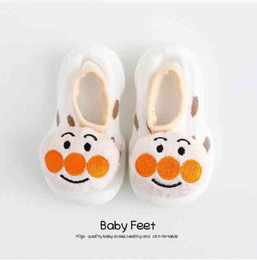 Funny face baby doll sock shoes, perfect for little ones' playful style and comfort.