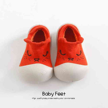 Red sleeping cat animal sock shoes for babies, perfect for cozy comfort and playful style.