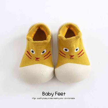 Yellow small cat animal sock shoes for babies - cute and cozy footwear for little ones.