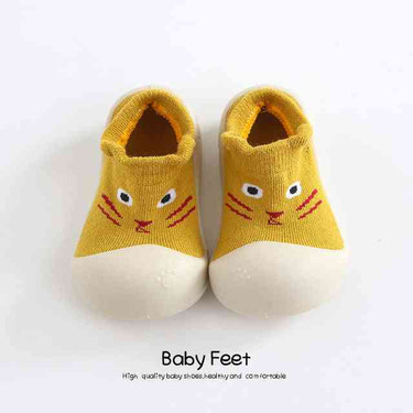 Yellow small cat animal sock shoes for babies - cute and cozy footwear for little ones.