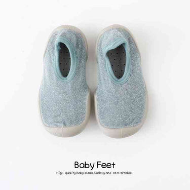 Light blue baby sock shoes, perfect for tiny feet and stylish comfort. Ideal for infants and toddlers.