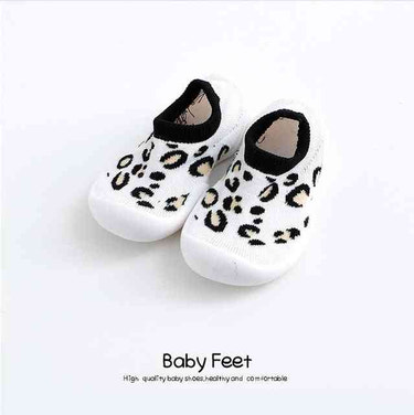 White leopard baby sock shoes, perfect for stylish and comfortable little feet. Ideal for infants and toddlers.