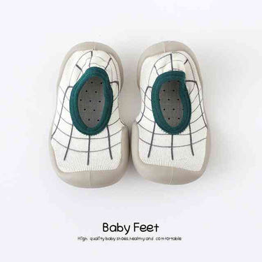 Green modern baby sock shoes for stylish comfort and support. Perfect for little feet!