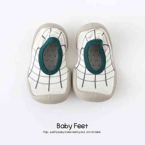 Green modern baby sock shoes for stylish comfort and support. Perfect for little feet!