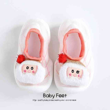 Pink Santa baby doll sock shoes, perfect for little ones' holiday outfits. Soft and cozy footwear for infants.