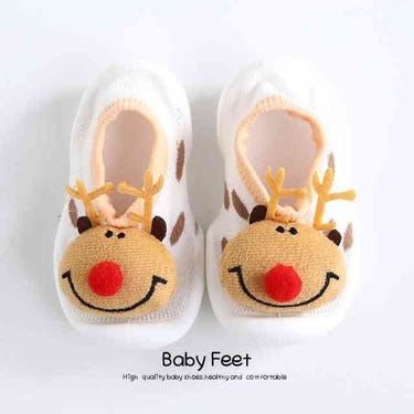 White Rudolph baby doll sock shoes, perfect for little ones. Soft, cozy footwear for stylish infants.