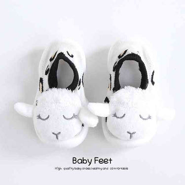 White sheep baby doll sock shoes for infants, perfect for stylish and comfortable footwear.
