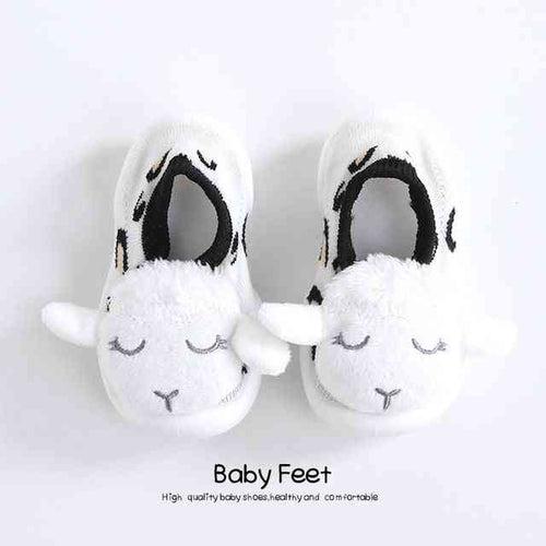 White sheep baby doll sock shoes for infants, perfect for stylish and comfortable footwear.