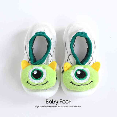 Big Eye Alien baby doll sock shoes for infants, perfect for stylish and comfortable footwear.