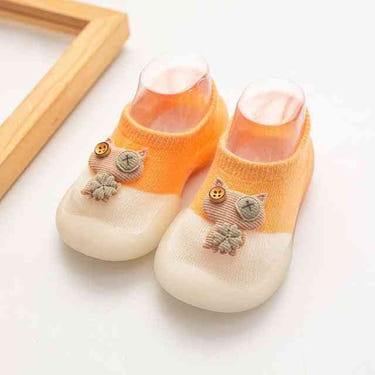 Cute orange baby owl shoes, perfect for little feet. Ideal for stylish infants and toddlers.