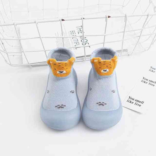 Cute tiger-pattern baby sock shoes for comfy and stylish little feet. Perfect for infants and toddlers.