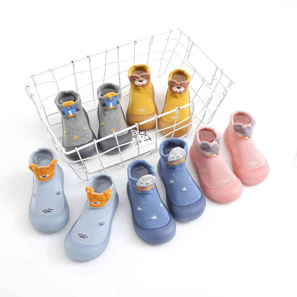 Baby bull pattern sock shoes, angle 2 view, perfect for little feet in style and comfort.