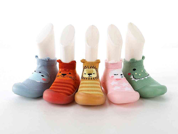 Blue monster-themed baby sock shoes, perfect for tiny feet, shown from angle 4. Ideal for comfort and style.