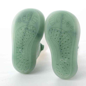 Baby Pet Sock Shoes in Monster Green, angle 4 view, perfect for tiny feet and playful adventures.