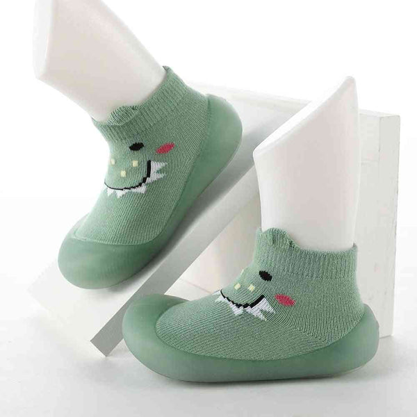 Baby Pet Sock Shoes in Monster Green, angle view 6, perfect for tiny feet and playful adventures.