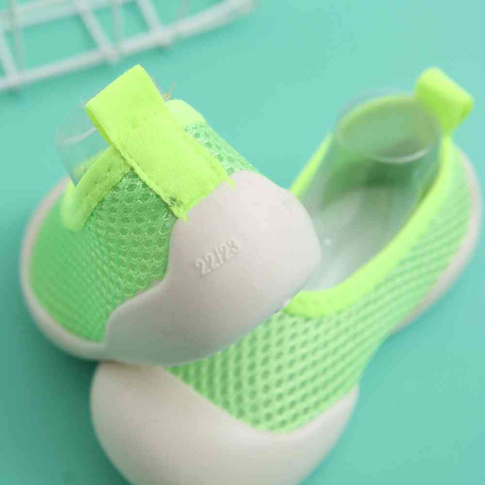 Light green baby first walkers - perfect shoes for your little one's first steps.