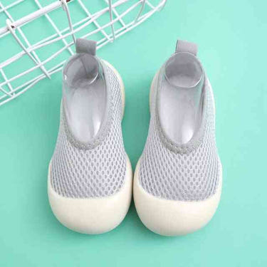 Light gray baby first walkers - stylish and comfortable shoes for your little one's first steps.