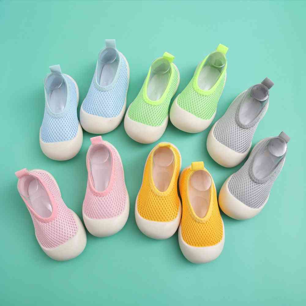 Light gray baby first walkers - stylish and comfortable shoes for your little one's first steps.