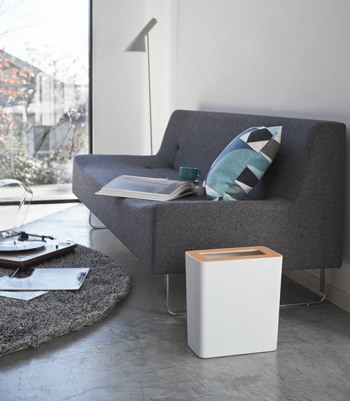 Rectangle steel and wood trash can for living spaces, stylish and functional waste solution.