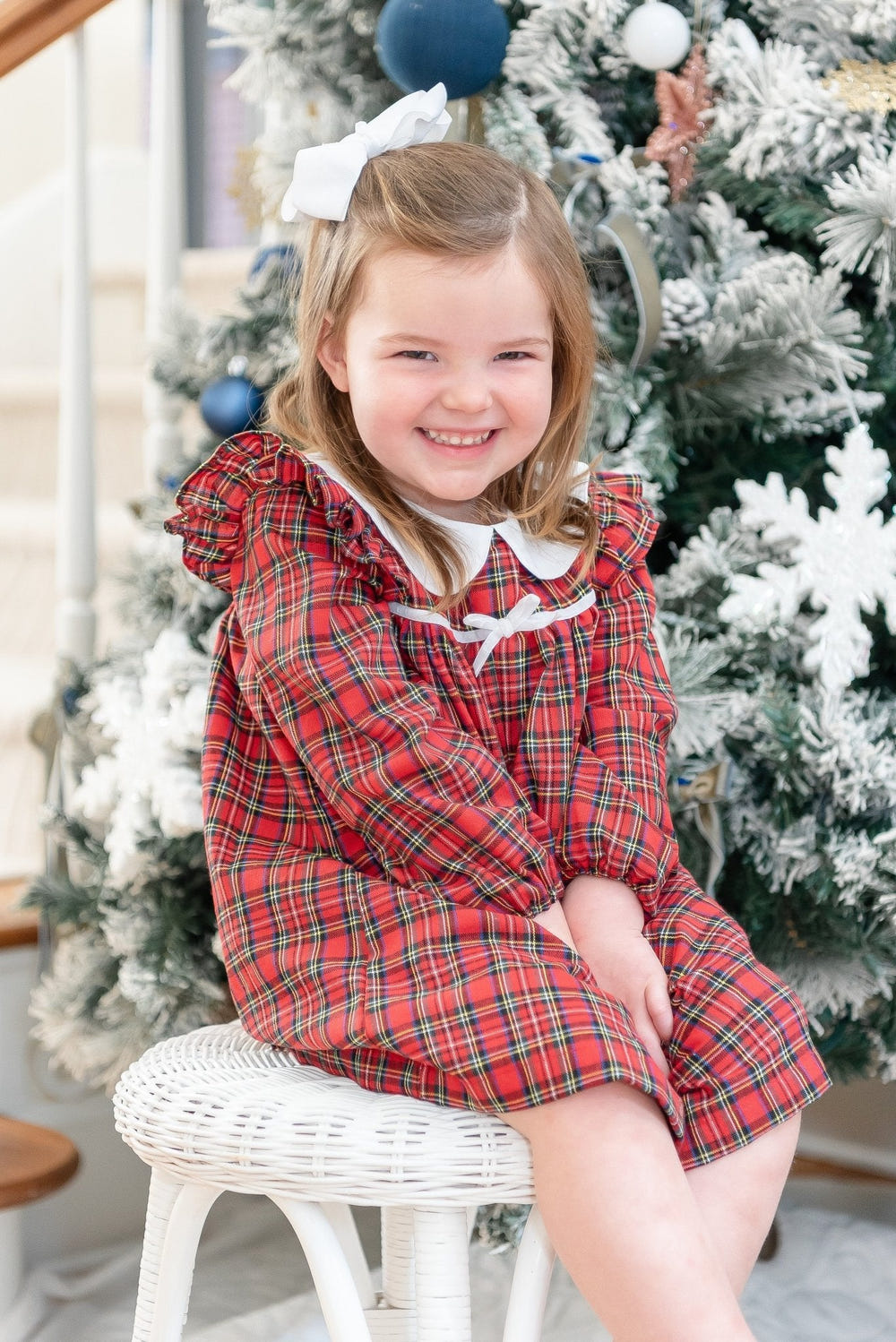 Red Christmas plaid collared ruffle dress for babies, perfect for holiday celebrations and festive occasions.